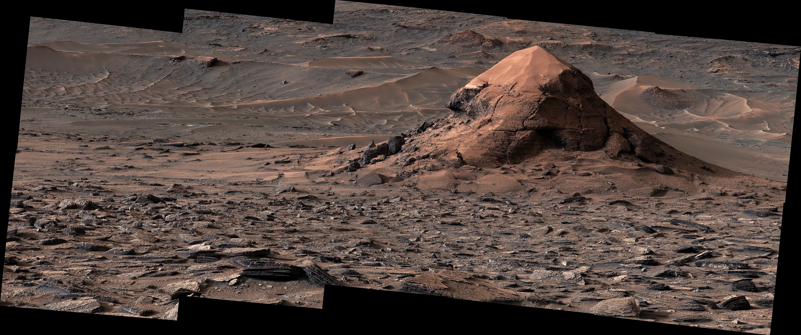 Curiosity Mastcam mosaic of the six-meter-tall sand-capped butte Miraflores in Valle Grande