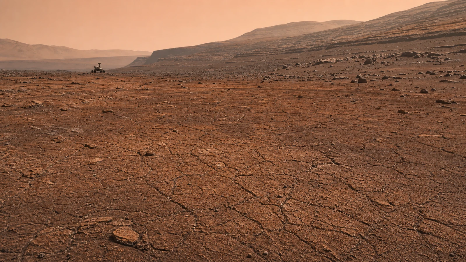Editorial visualization of polygonal fracture terrain in Valle Grande on Mount Sharp, with Curiosity in the distance